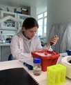 Mariana Kuznietsova in the lab at DANDRITE. Photo by DANDRITE. 