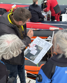 Divers being instructed prior to a dive