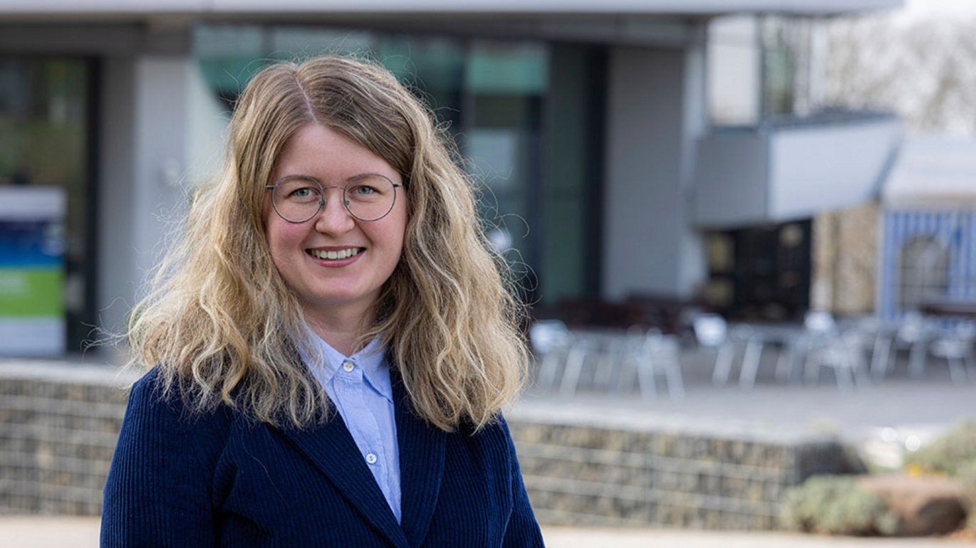 Ieva outside of EMBL in a dark jacket