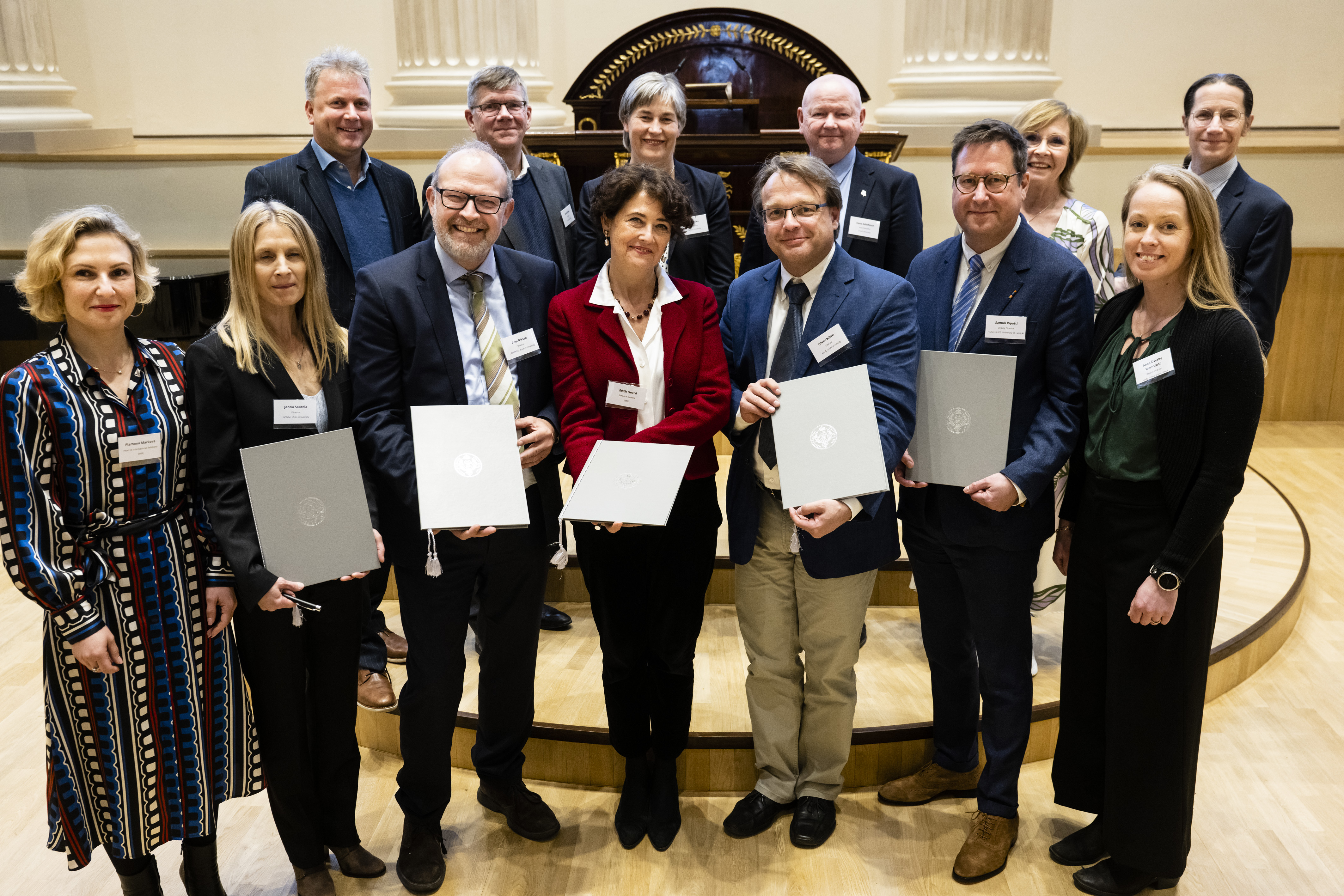 The signatories of the renewed agreement for Nordic EMBL Partnership for Molecular Medicine accompanied by other key stakeholders of the Nordic EMBL Partnership. Upper row, from left to right: Ewan Birney (Deputy Director General EMBL), Svein Stølen (Rector University of Oslo), Eika Berit (Prorector Aarhus University), Hans Adolfsson (Rector Umeå University), Sari Lindblom (Rector University of Helsinki), Mark Daly (Outgoing FIMM Director). Lower row, from left to right: Plamena Markova (Head of International Relations EMBL), Janna Saarela (NCMM Director), Poul Nissen (DANDRITE Director), Edith Heard (EMBL Director General), Oliver Billker (MIMS Director), Samuli Ripatti (FIMM Vice Director), Anna Överby Wernstedt (MIMS Deputy Director). Photo by Veikko Somerpuro.